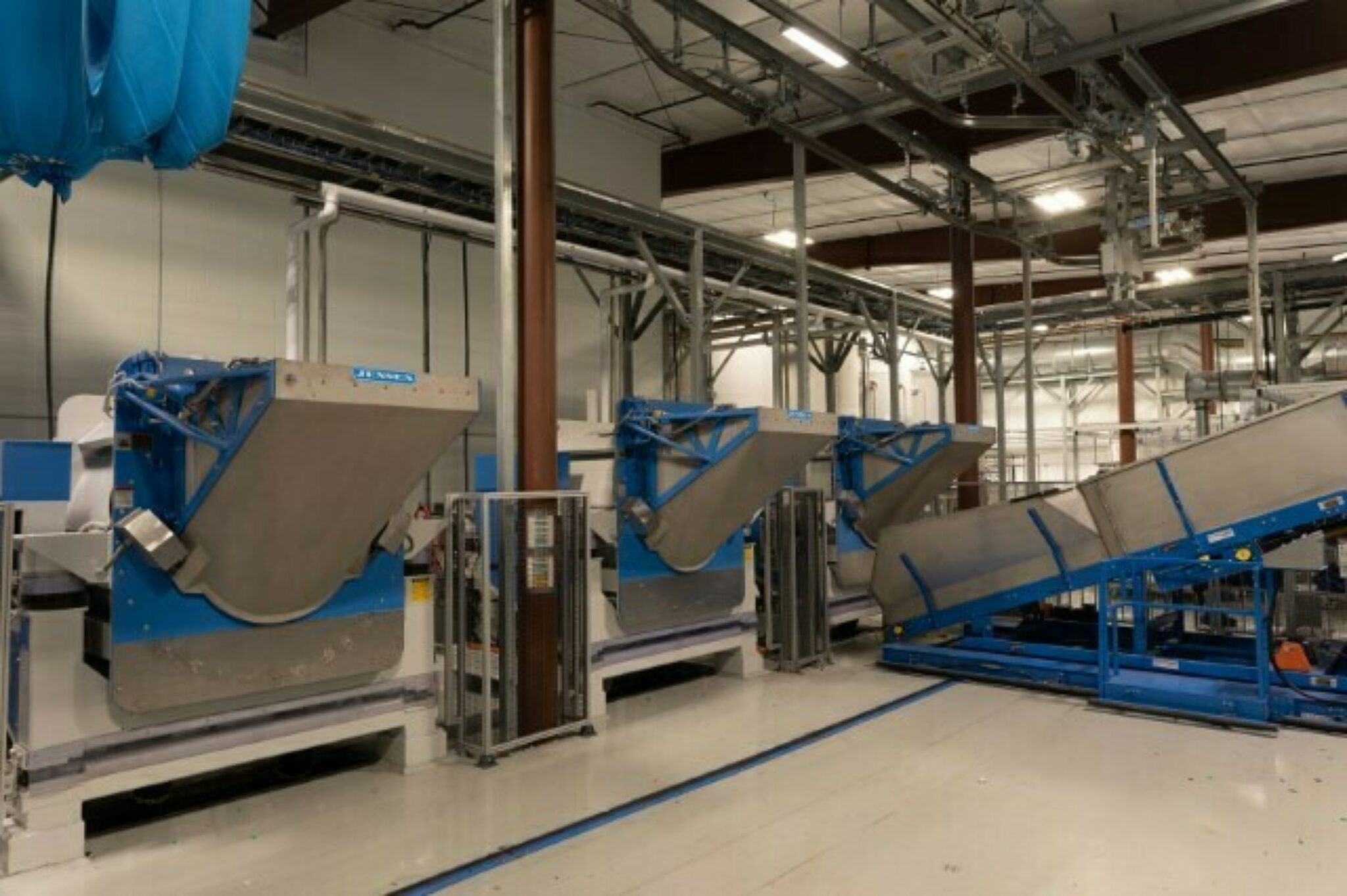 Photograph of Kinectrics' laundry facility conveyor belts and chutes