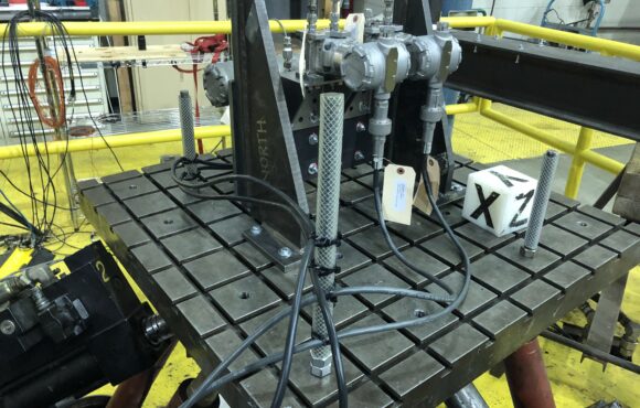 Machine part mounted onto a seismic table for testing