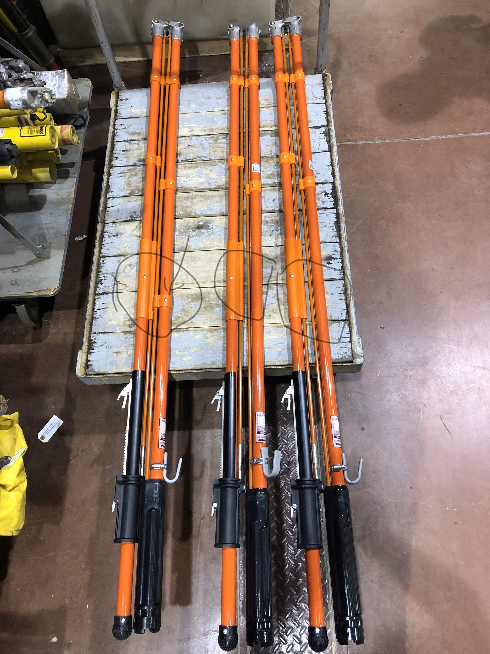 Live line tools used during in-field mobile electrical testing services