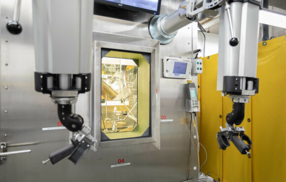 Remote manipulators in front of a "warm cell"