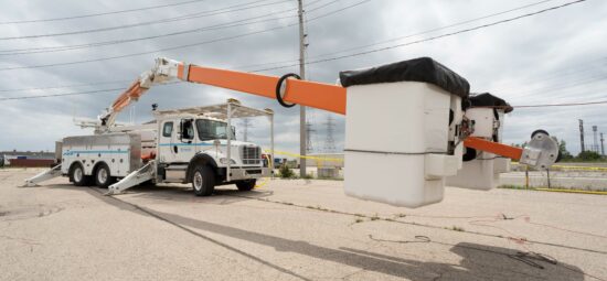 Bucket truck deployed next to a power line