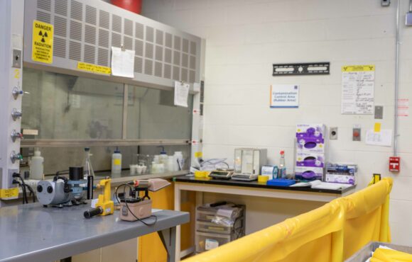 Interior photograph of the contamination control area with a Kinectrics laboratory