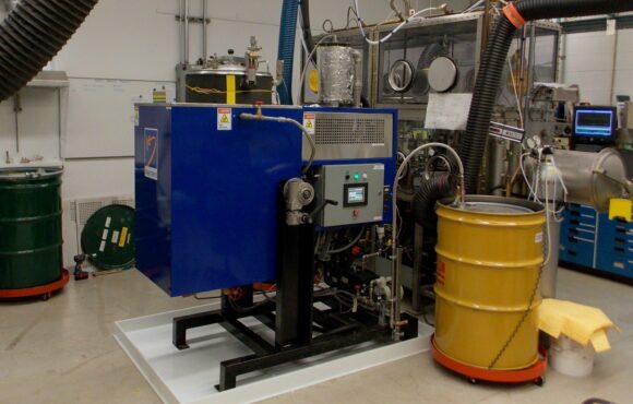 Side-view photograph of large heavy water handling equipment