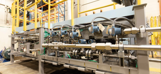 Large skid full of machinery with identification tags